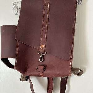 Handmade genuine leather backpack with water bottle holder